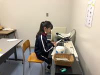 写真：委員会からの報告の様子1