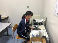 写真：委員会からの報告の様子2